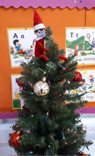 Elf on the Shelf on a Christmas Tree