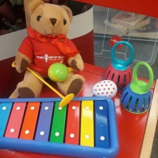 Teddy playing xylophone