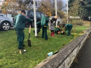 Boys planting Daffodils