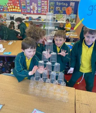Boys doing cup challenge